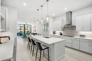 Fridge, microwave, oven, stovetop - Ocean's Edge | Lavish NEW Condo w Beach Views, Cozy Decor & Fab Resort Amenities (Melbourne Beach)