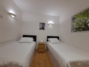 1 bedroom, iron/ironing board, travel crib, WiFi
