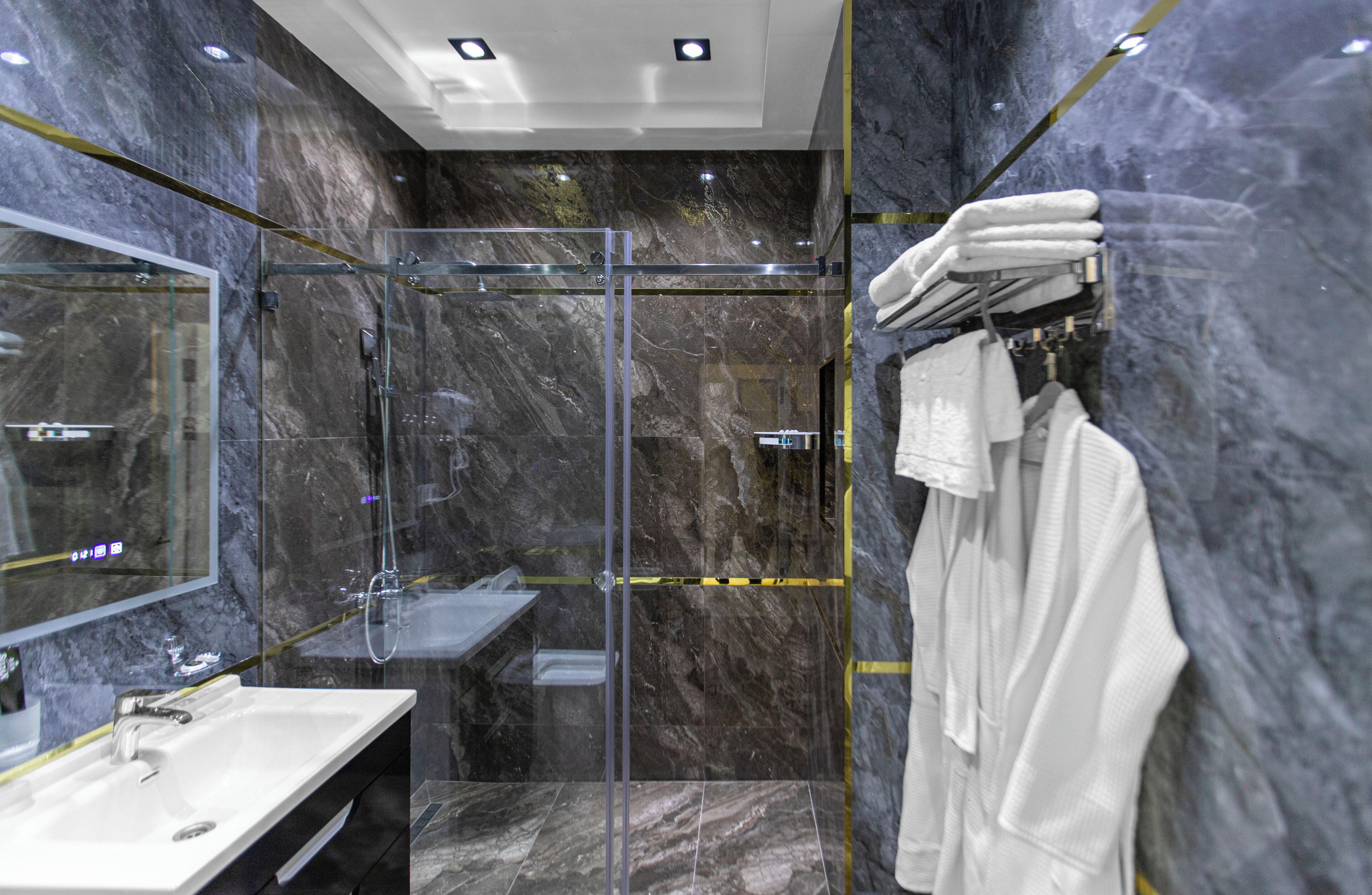 Deluxe Triple Room | Bathroom | Shower, hydromassage showerhead, designer toiletries, hair dryer