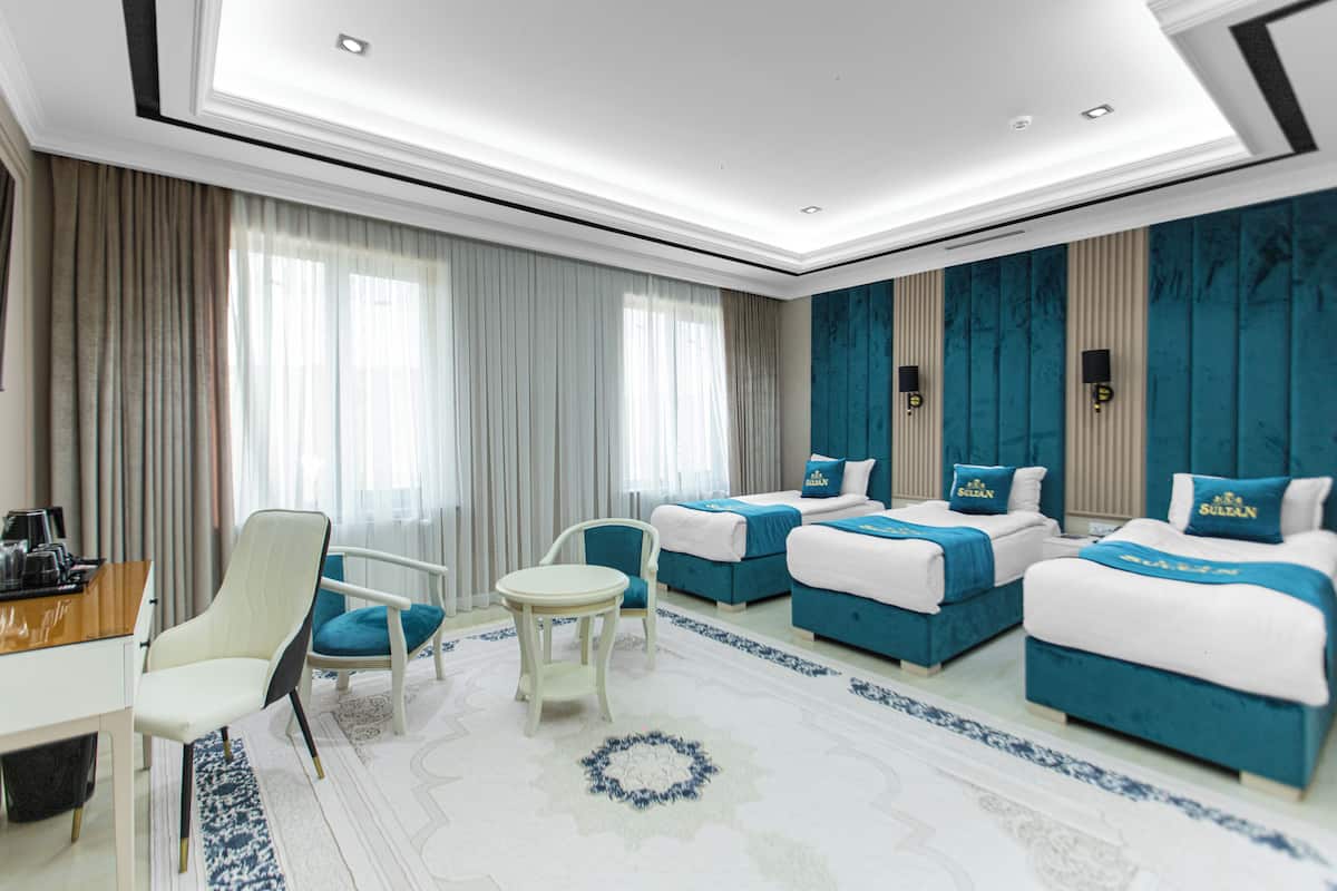 Deluxe Triple Room | Bathroom | Shower, hydromassage showerhead, designer toiletries, hair dryer