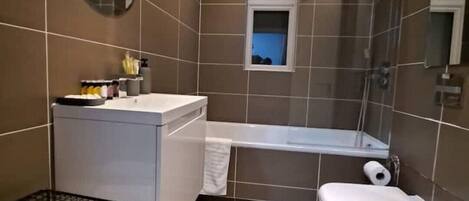 Hair dryer, towels, soap, shampoo