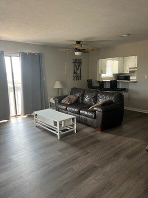 Deluxe Condo, Multiple Beds, Kitchen | Living area | 45-inch Smart TV with digital channels, streaming services - The Moorings Hotel and Marina  (Carrabelle)