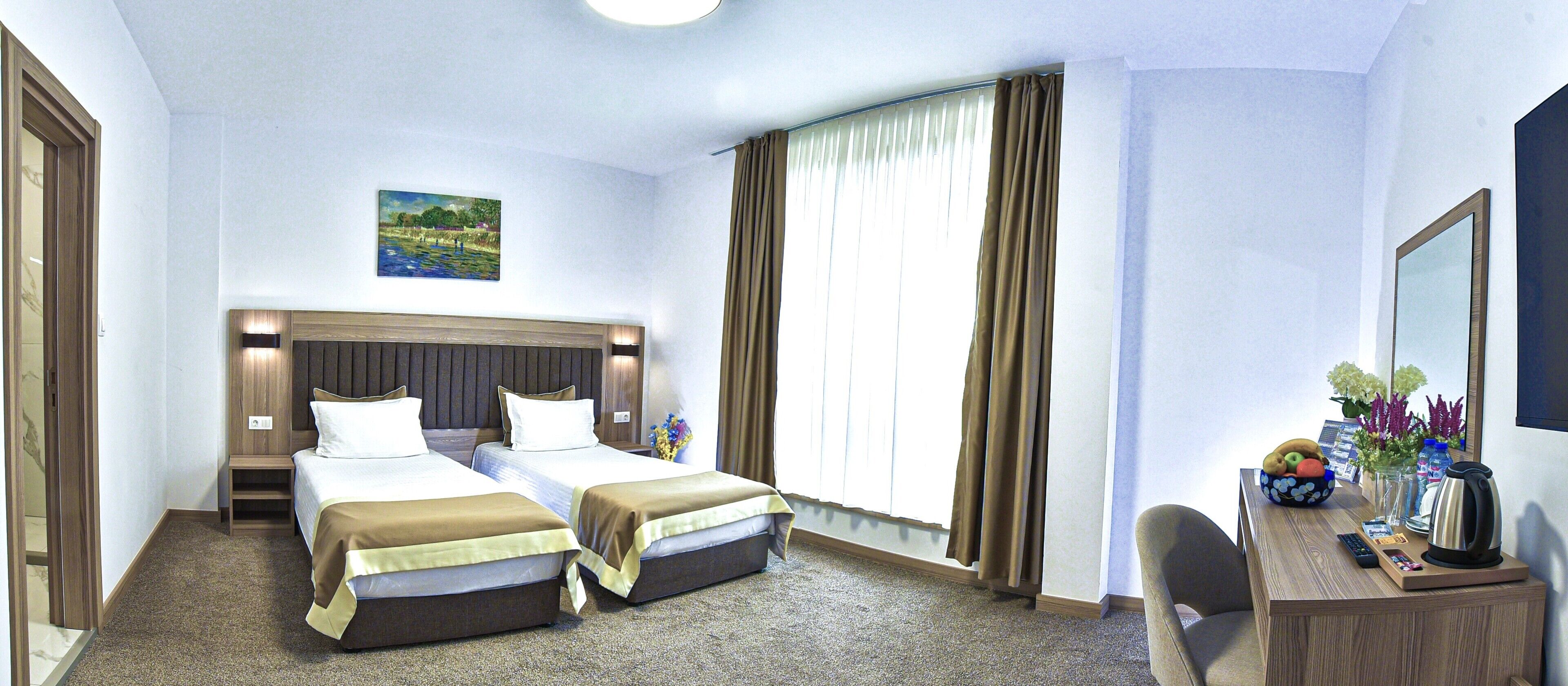 Deluxe Twin Room, City View | Premium bedding, minibar, in-room safe, desk