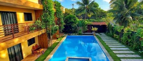 Outdoor pool, open 8:00 AM to 8:00 PM, free cabanas, sun loungers