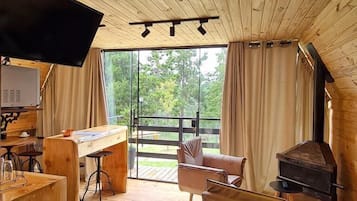 Romantic Cabin | Living area | 32-inch Smart TV with digital channels, fireplace, Netflix