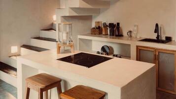 Fridge, stovetop, coffee/tea maker, cookware/dishes/utensils