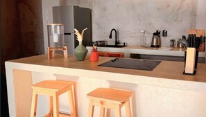 Fridge, stovetop, coffee/tea maker, cookware/dishes/utensils