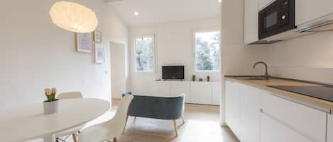 Comfort Apartment, Garden View | Living area