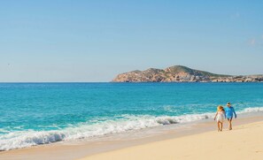On the beach, sun-loungers, beach towels