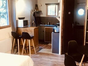 Fridge, electric kettle, toaster, cookware/dishes/utensils