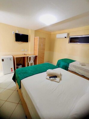 Standard Triple Room, Multiple Beds | Desk, laptop workspace, free WiFi, bed sheets
