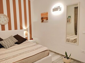 2 bedrooms, desk, iron/ironing board, travel crib