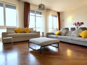 Luxury Apartment, 3 bedrooms, (Corso di Porta Romana 52) | Living area | 60-inch Smart TV with digital channels, Netflix, streaming services