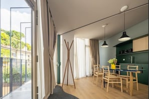 Superior Apartment, 2 bedrooms (Corso di Porta Romana 101) | Living area | 60-inch Smart TV with digital channels, Netflix, streaming services
