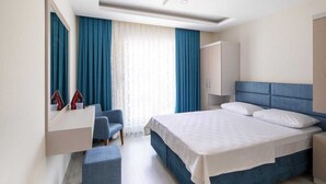 Apartamento básico | 1 dormitorio, cortinas opacas, tabla de planchar con plancha