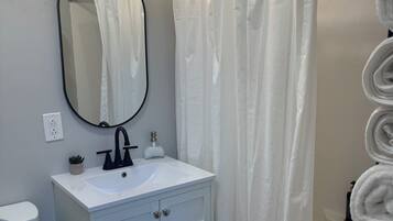Hair dryer, towels, soap, toilet paper