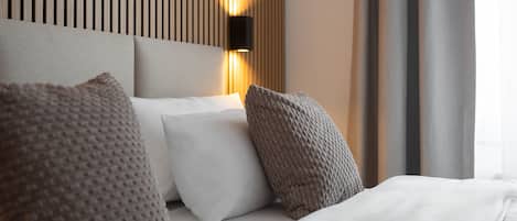 1 habitación, tabla de planchar con plancha, cuna de viaje y wifi