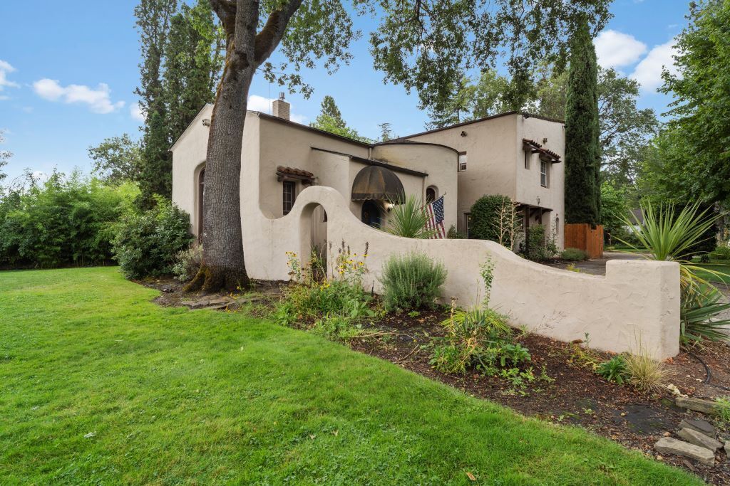 Stunning Spanish-style home is a true architectural gem - 4 bdrm 2 bth  