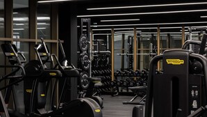 A gym with treadmills, weight machines, and free weights. - Nuvola Suite by Casacity (Manchester)