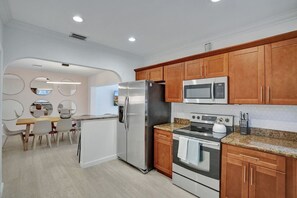 Fridge, microwave, oven, stovetop - Casa Bella - 5 BR Villa in Miami with Pool, Mini-Golf, Basketball+ (Miami)