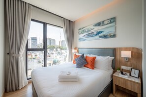 Suíte empresarial, 1 quarto, acesso ao Club Lounge, vista para a cidade | Vista do quarto