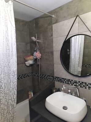 Hair dryer, towels, soap, shampoo