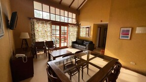 Family Cabin | Living area | Flat-screen TV - Hotel y Cabañas Huallilemu Sur- Caja Los Andes (El Quisco)