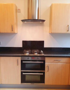 Apartment | Private kitchen | Fridge, microwave, oven, stovetop
