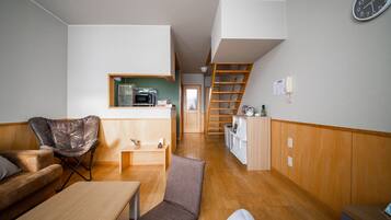 Basic Apartment | Living area | Flat-screen TV