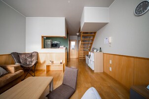 Basic Apartment | Living area | Flat-screen TV