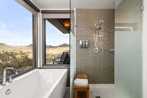 Shower, hair dryer, towels, shampoo