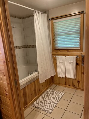 Jetted tub, hair dryer, towels, soap