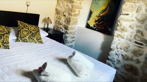 3 slaapkamers, een strijkplank/strijkijzer, beddengoed