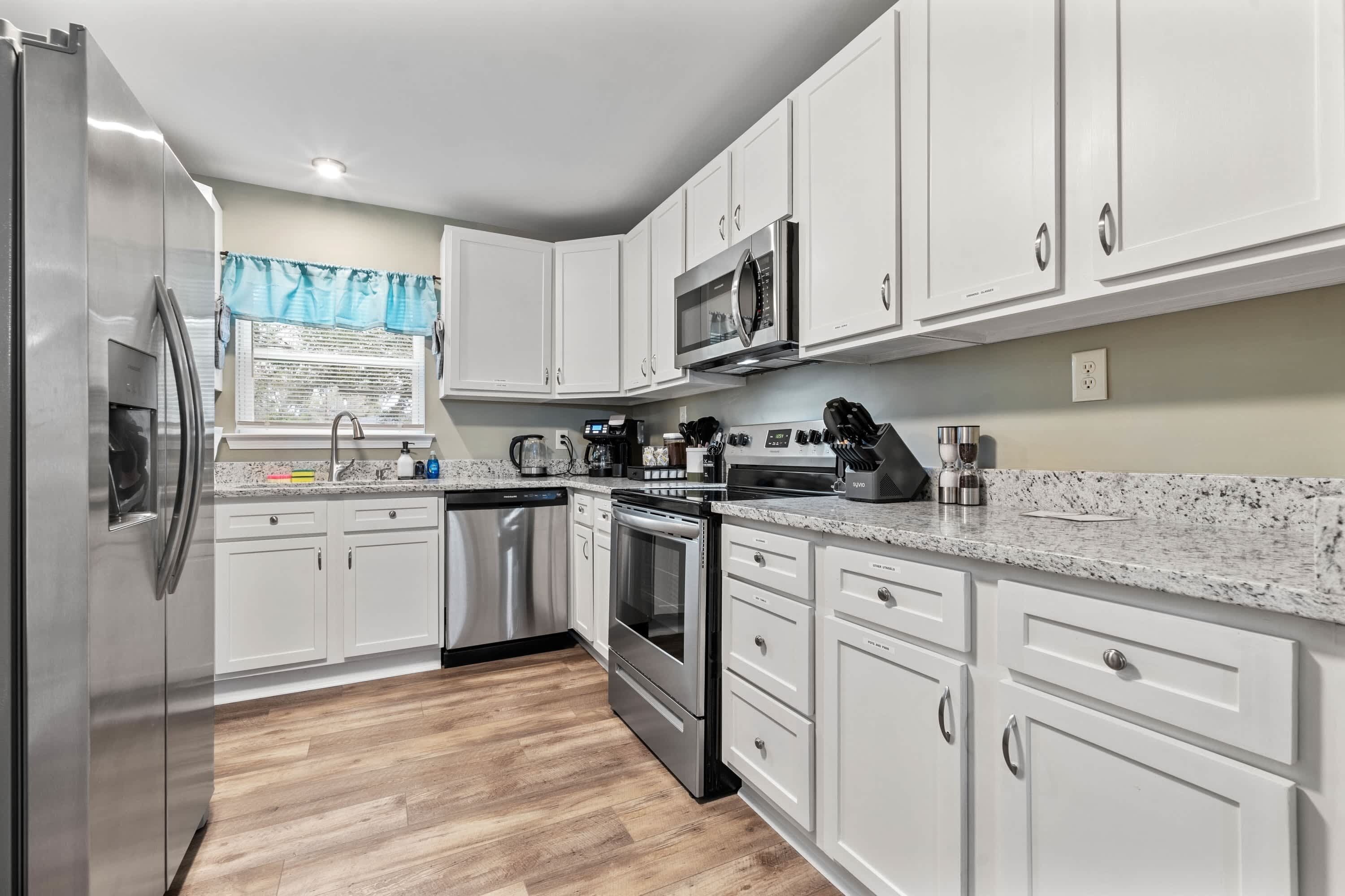 Fridge, microwave, dishwasher, coffee/tea maker