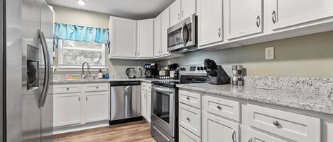 Fridge, microwave, dishwasher, coffee/tea maker