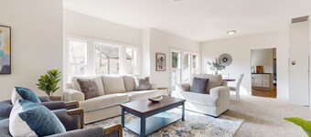 Perfectly located home with open layout, well-equipped kitchen, smart TV, & W/D