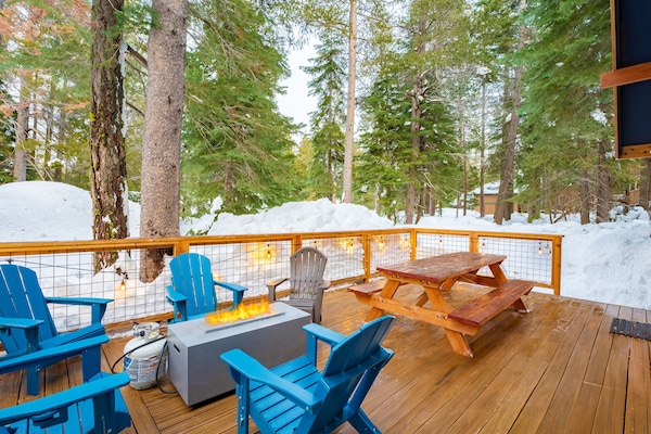 Deck also offers a picnic table and firepit.