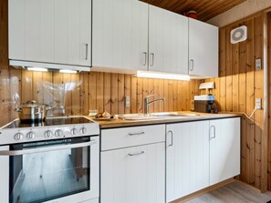 Fridge, oven, high chair, cookware/dishes/utensils