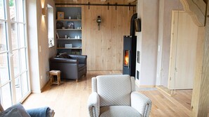 TV, fireplace - Ferienhaus Holzmichel, 1-4 Pers (Haltern am See)