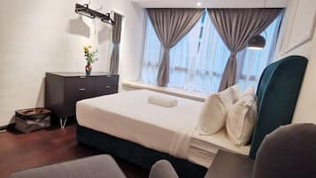 Blackout curtains, iron/ironing board, free WiFi, bed sheets