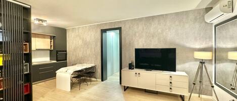 Apartment | Living area | 32-inch LCD TV with cable channels