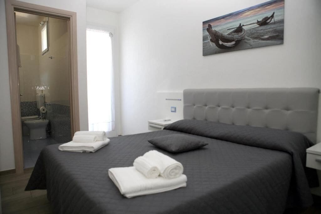 Desk, laptop workspace, free WiFi, bed sheets