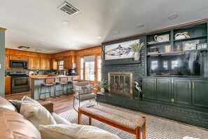 TV, fireplace, books, stereo