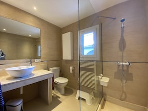 Hair dryer, towels, soap, toilet paper