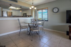 Enjoy meals in this cozy dining area with a round table and four chairs.