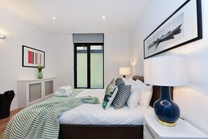 2 dormitorios, tabla de planchar con plancha, wifi gratis y ropa de cama