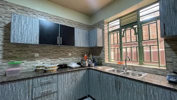 Apartment | Private kitchen | Fridge, microwave, stovetop, electric kettle