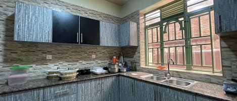 Apartment | Private kitchen | Fridge, microwave, stovetop, electric kettle