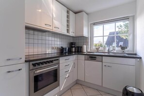 Réfrigérateur, four, plaque de cuisson, lave-vaisselle