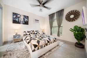 1 bedroom, desk, iron/ironing board, travel crib